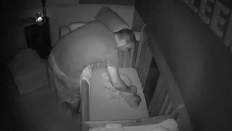 Baby Cries While In Crib, Pretends To Sleep When Dad Walks In