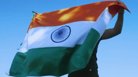 young man flying india flag
