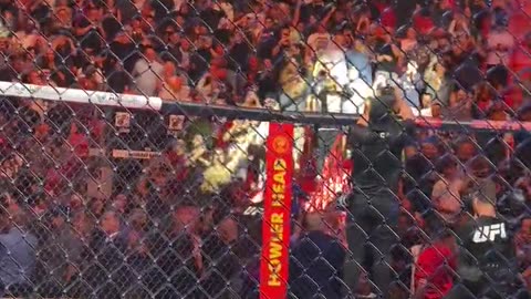 Crowd chanting as Donald Trump and Kid Rock take their seats octagonside for UFC287