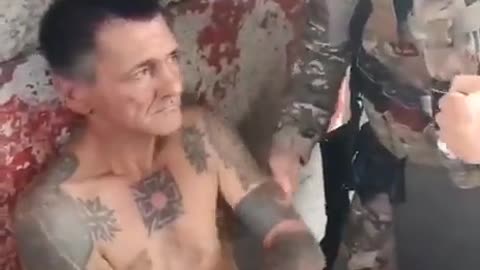 Russian soldier slap a Nazi Ukrainian azov battalion captive