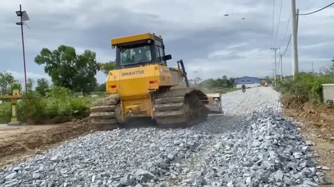 New bulldozer spreading gravel processing features building road foundation-19