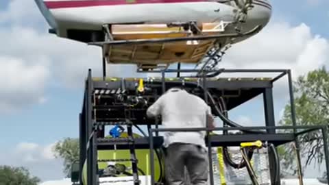 Pilot Lands His Helicopter Neatly Over Truck