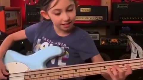 This is Ellen Alaverdyan. 9-year old bassist. Wait for the smile...