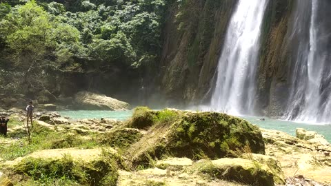 Happy holiday in beautifull waterfall