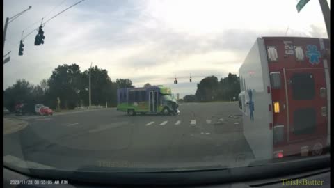 Dash cam video shows bus carrying 15 people slamming into ambulance at Florida intersection