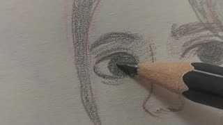 A simple pencil sketch of a girl's face.
