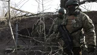 Ukrainian soldiers patrol Donetsk front line region with armoured vehicles