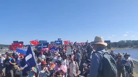 Canberra Massive crowd of protesters on their way to parliament in the Aussie capital