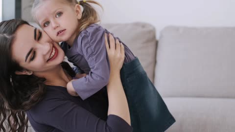 Mom love with cute baby girl.