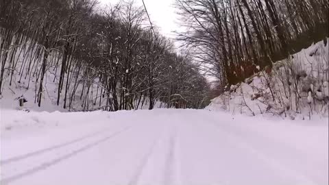 Snowy landscape accompanied by relaxing music