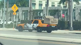 Taxicab Hauls Couch