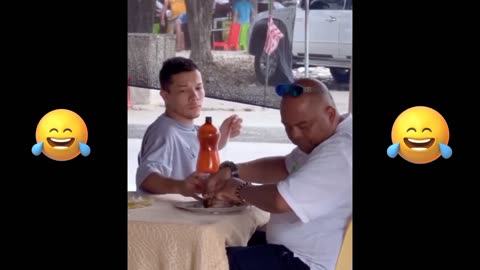 A man pranks people who are drinking soda