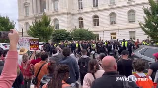 BREAKING: Dozens of the protestors in the Capitol are being marched out in handcuffs!