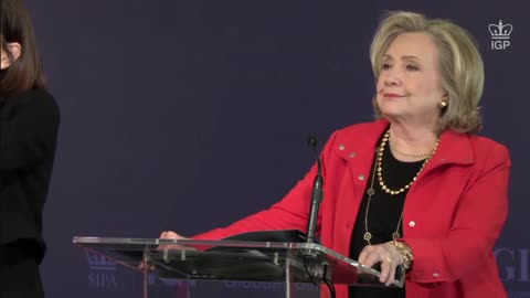 Protester accuses Hillary Clinton of being a war criminal