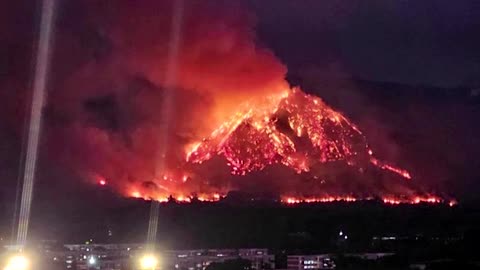 Wildfire engulfs mountain in Thailand