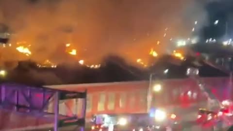 Multiple firefighters are battling a massive Hazardous Chemical Warehouse fire Queens, New York