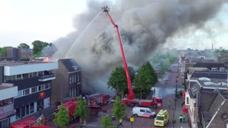 Fire Men Attempt to put out Raging House Fire