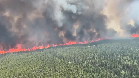 British Columbia wildfire exhibiting 'extreme behavior' as town races to evacuate