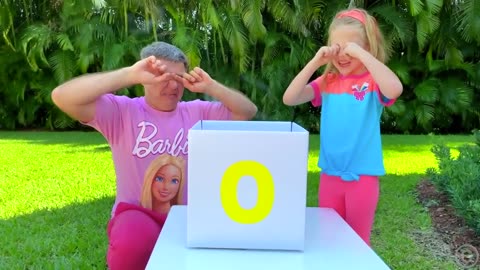 Nastya and dad open boxes with surprises to learn the alphabet.