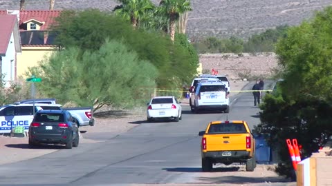 Henderson police shoot suspect with gun before house fire