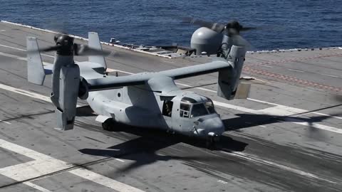 V 22 OSPREY CONDUCT LANDING AND LAUNCING ABOARD THE USS ABRAHAM LINCOLN AIRCRAFT CARRIER