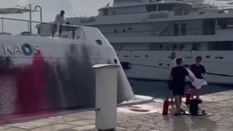 Spain Eco-activists attack £241 million superyacht in Ibiza.