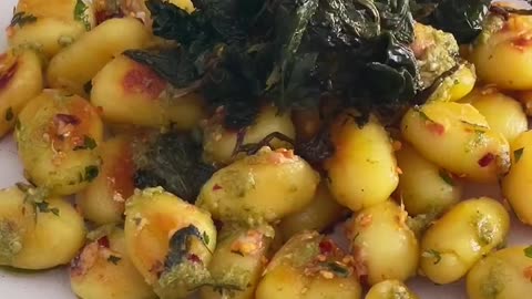 "Sizzling Spice meets Savory Comfort: Chilli Garlic Gnocchi with a Crispy Spinach Twist"
