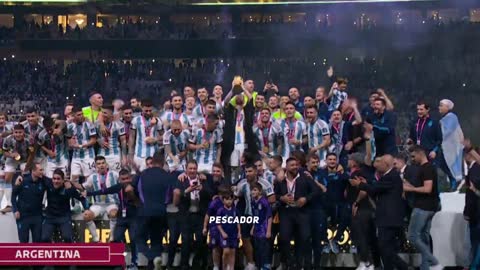 Messi Lift World Cup 2022 Trophy in a Historical Moment HD