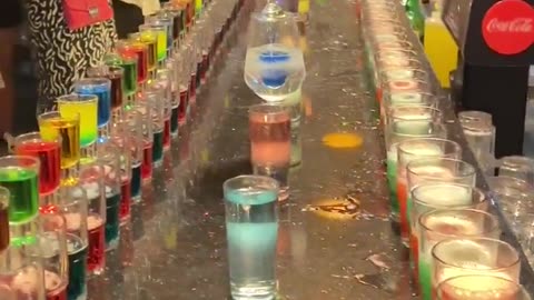 Amazing~Colorful drinks lined up and expertly mixed!
