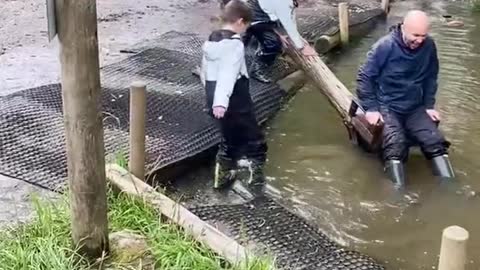 Boy falls in pond