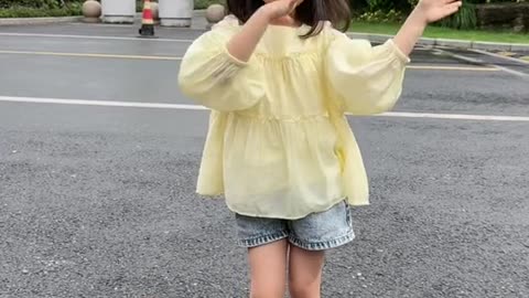 cute baby dancing on the street personality