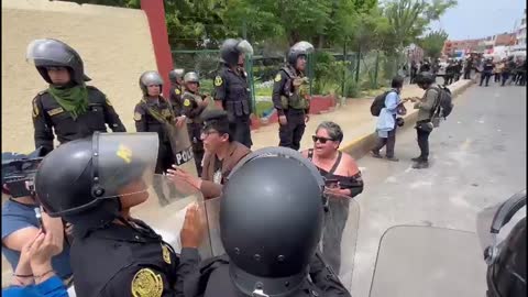 Protesters blocked from entering a university in Lima, Peru