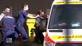 Armed man in hospital after Sydney cop shooting