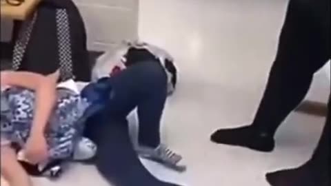 Black teacher abuses white kid