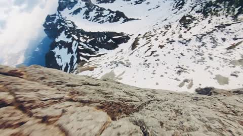 Drone Footage Of A Mountain Landscape With Snow