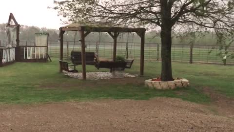 High Winds Send Anchored Down Trampoline Over Fence