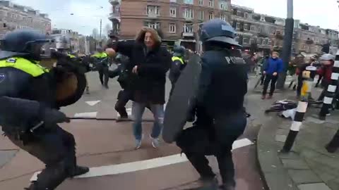 Amsterdam Agents of the State Enforcing Medical Tyranny By Attacking Unarmed People - 2