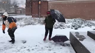 Playing snow with my friend