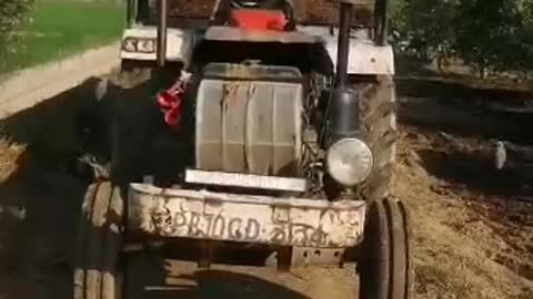 Farming. Tractor. Tractor playing