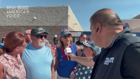 RAV's David Zere visits with excited MAGA rally goers at Liberty High School
