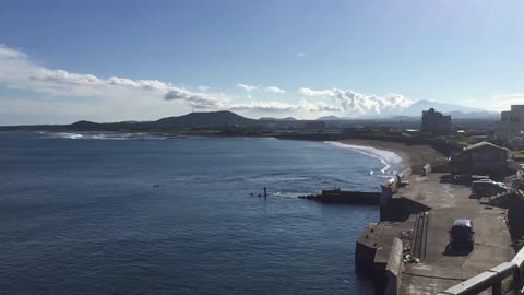 Jeju Island windy beach and blue sky