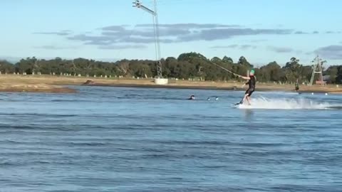 Wakeboarder fails backflip attempt