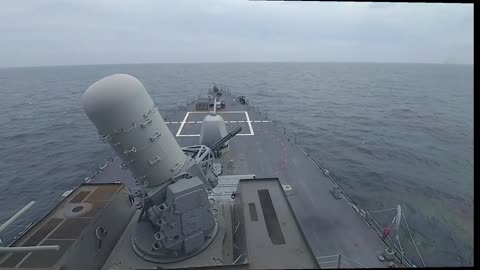 A close-in weapon system fires aboard the Arleigh Burke-class guided-missile destroyer
