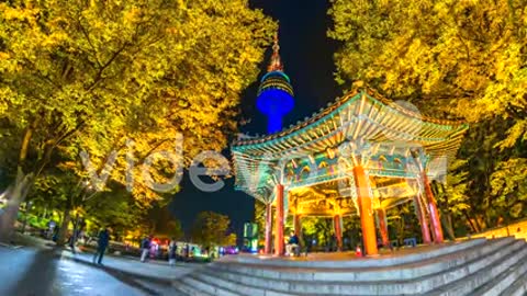 4K, Time lapse view of Seoul Tower in autumn at Night landmark of Seoul city South Korea