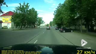 Motorcycle collision into turning car