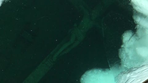 Icy Underwater Crucifix