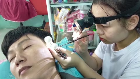 ASMR | Ear Wax Removal Relaxing with Cute Young Girl in Vietnamese Barbershop