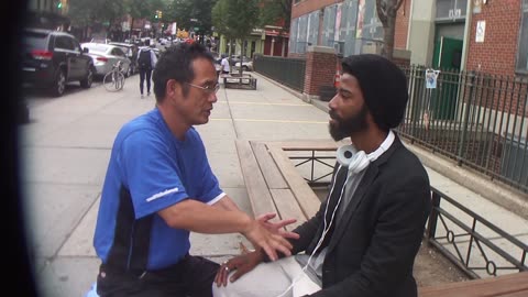 Luodong Massages Gentle Black Man On Bench