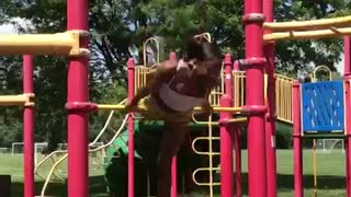 Woman performs insane flips on playground bar