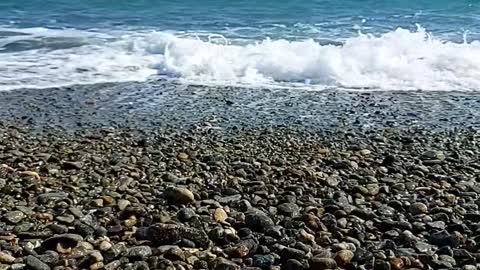 First-person view of the gravel beach